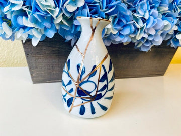 Kintsugi Repaired White Sake Bottle with Blue Petals